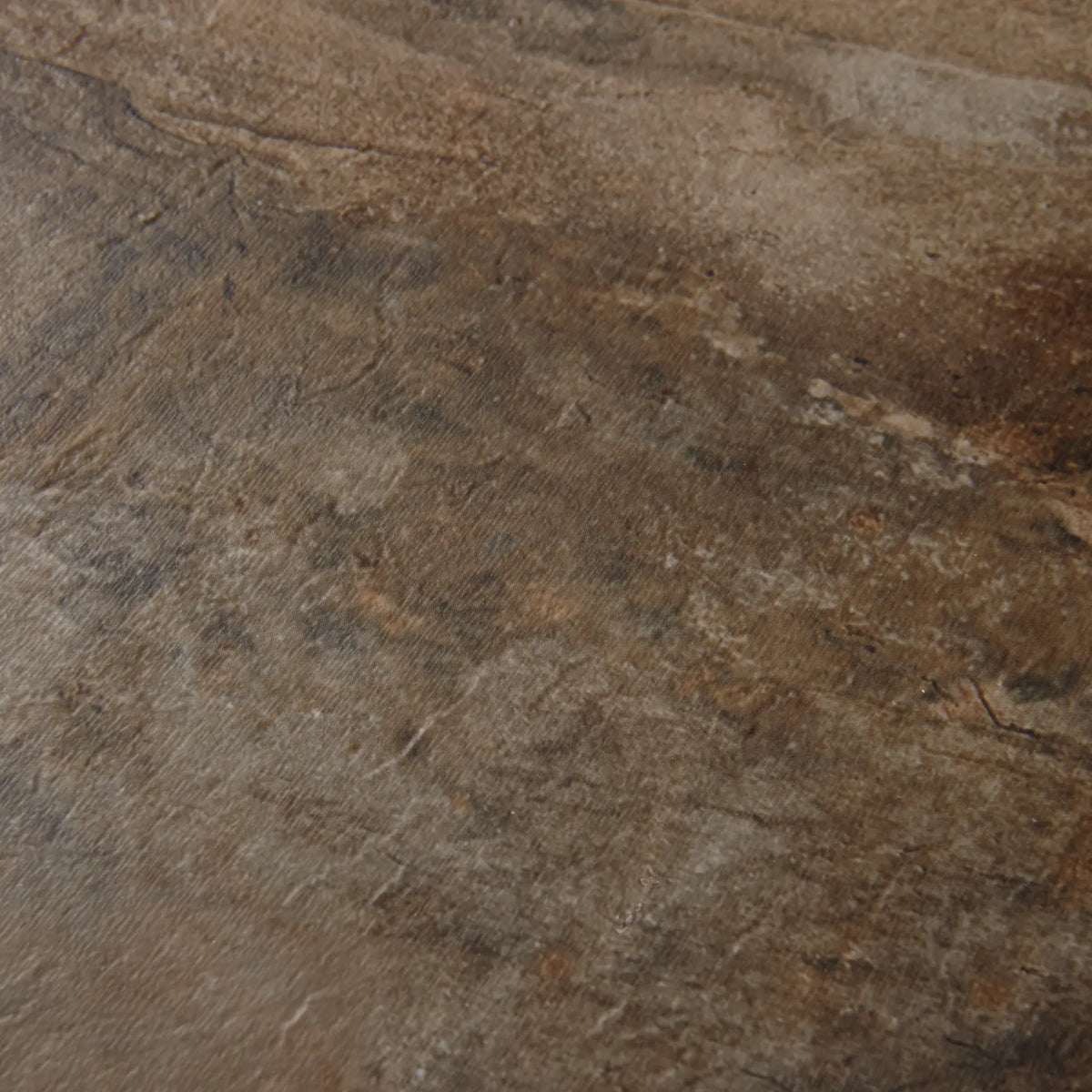 Close-up of a brown and gray stone surface