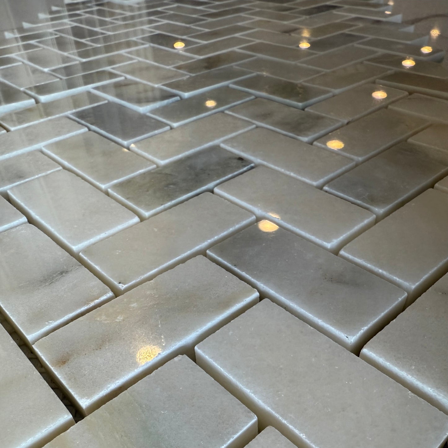 Close-up of gray tiles with a geometric pattern