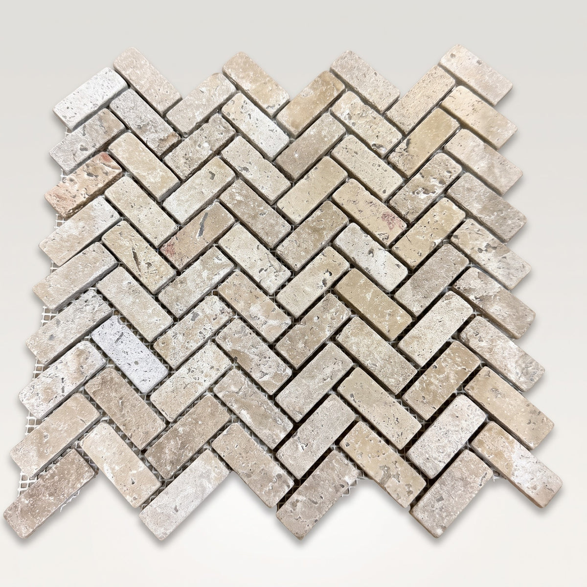 Chocolat Mini Herringbone Tumbled marble mosaic sheet