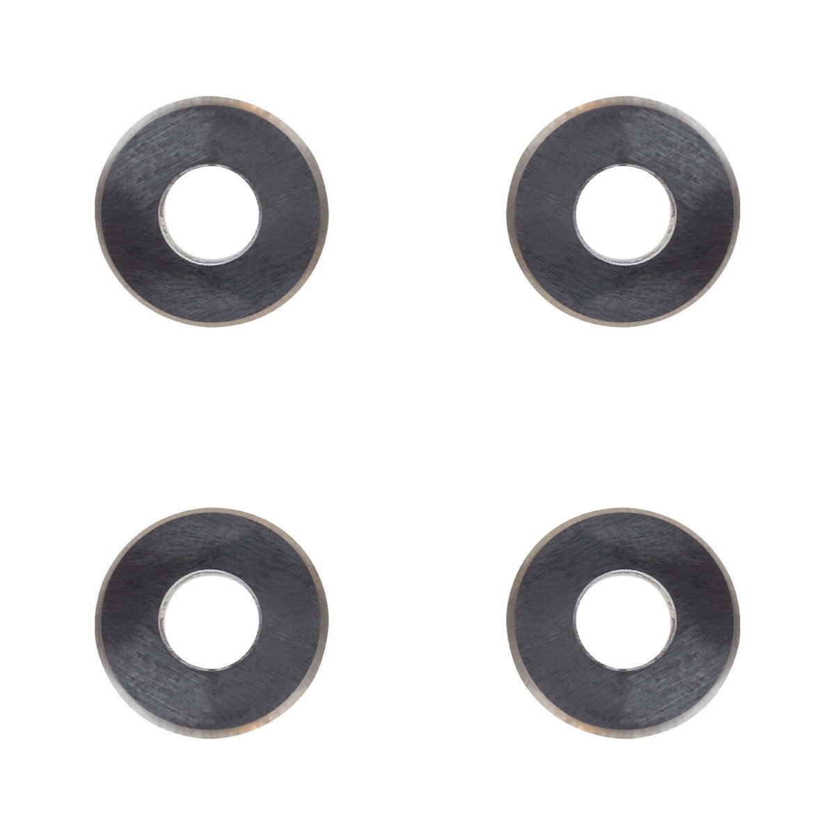 Four metallic scoring wheels on a white background