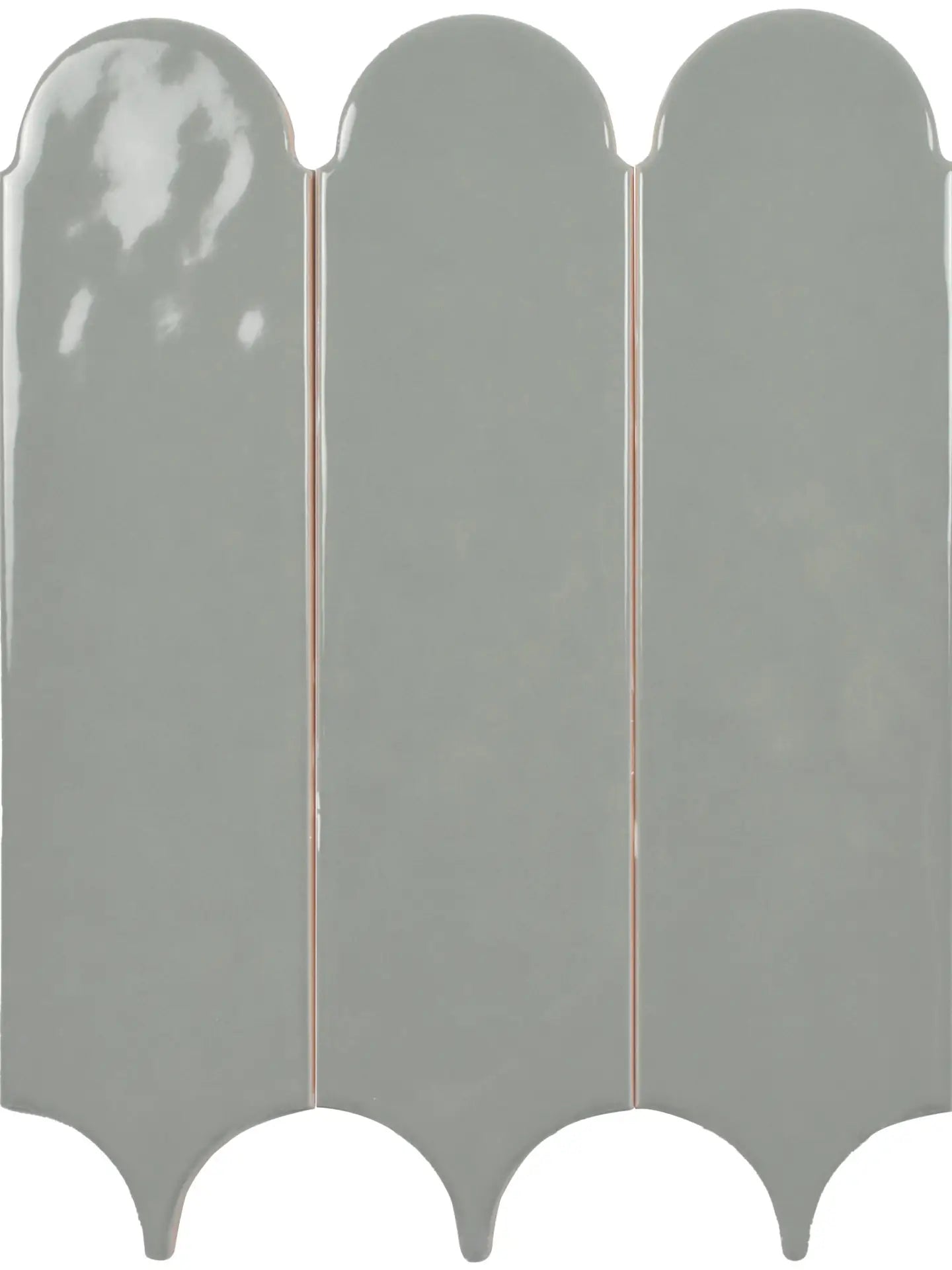 Three glossy, vertically oriented ceramic wall tiles with a scalloped or wavy bottom edge, shown side-by-side against a plain white background.