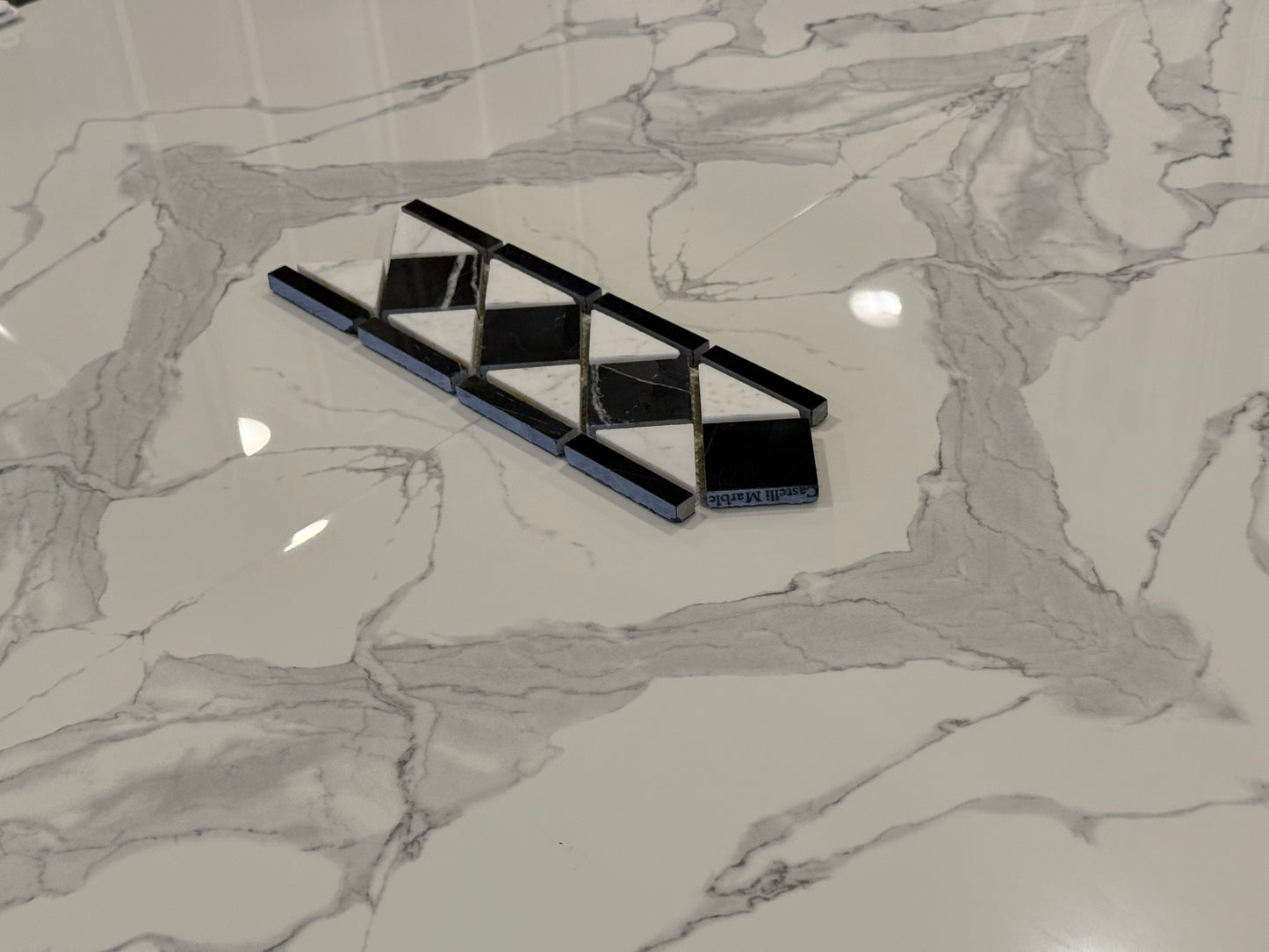 Statuary & Nero Border 4x12 Polished