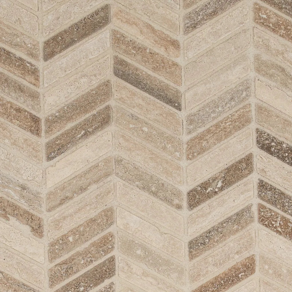 Close-up of a beige and brown chevron patterned tile