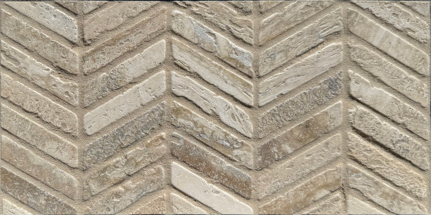 Patterned stone tile with a chevron design in beige and brown tones.