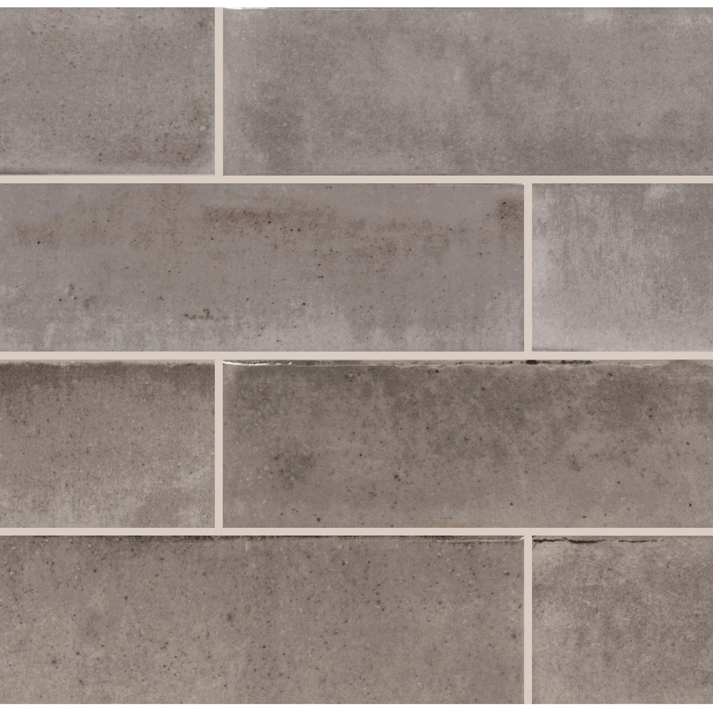 Gray tiles with a subtle pattern on a gray background