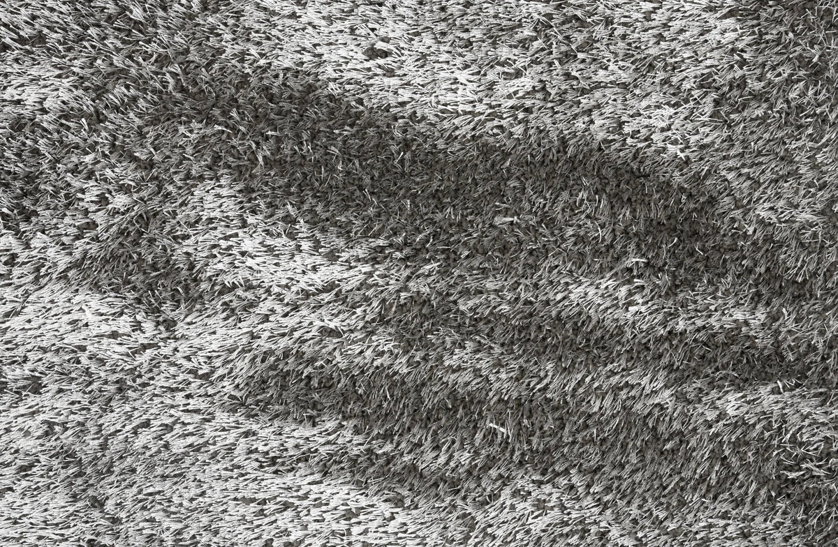 Close-up of a textured gray carpet