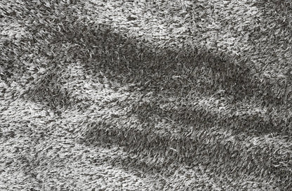 Close-up of a textured gray carpet