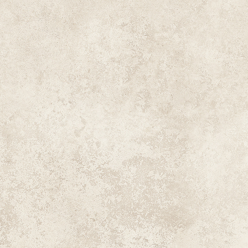 A close-up of a textured beige surface with a mottled, stone-like finish.