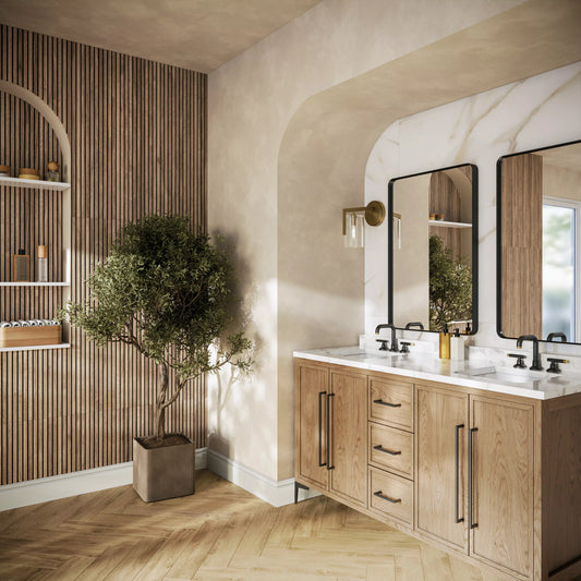 Modern bathroom with wooden vanity, mirrors, and a plant.