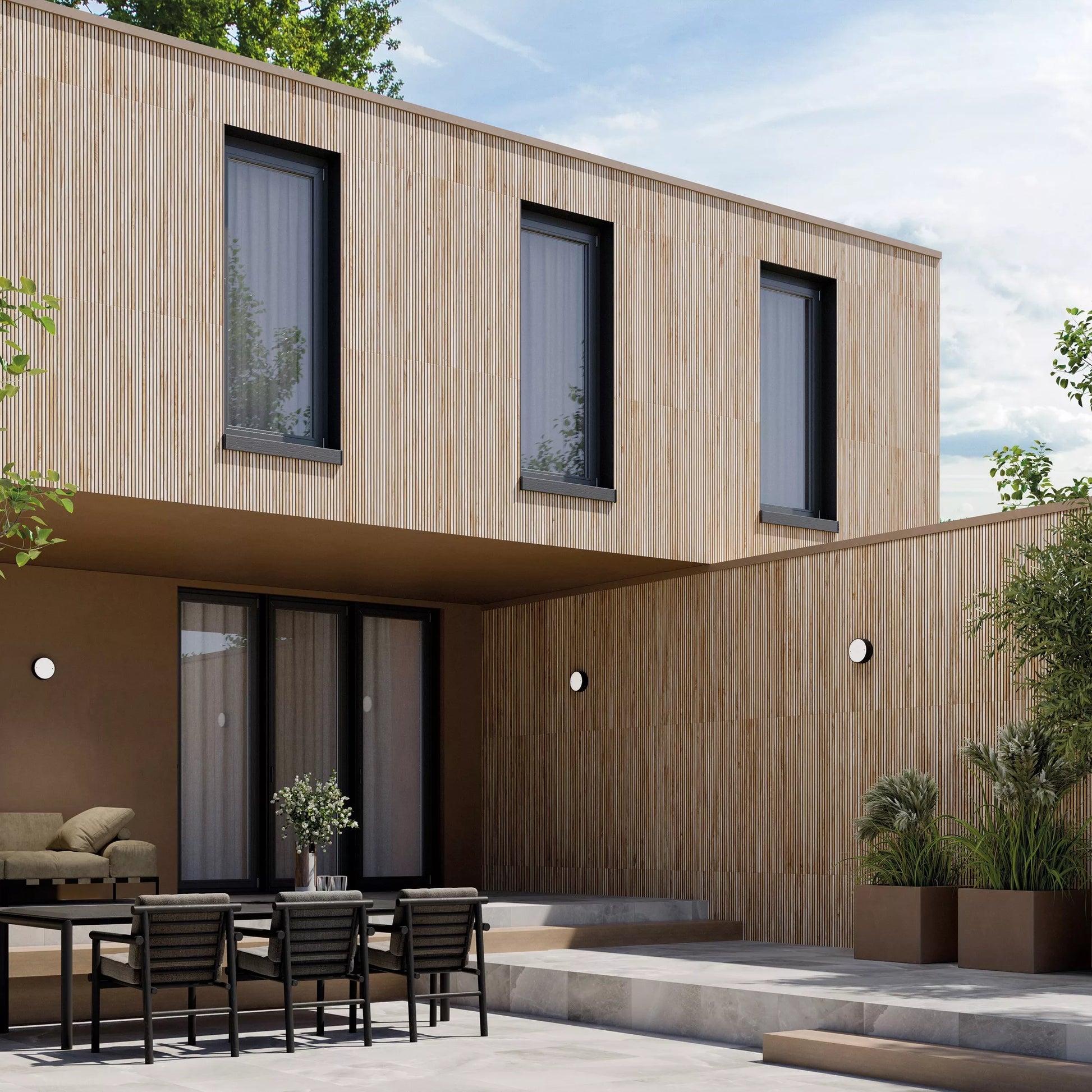 Modern house exterior with wooden facade, outdoor seating area, and potted plants.