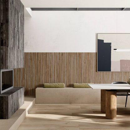 Modern living room with wooden floor, striped wall, and minimal decor.