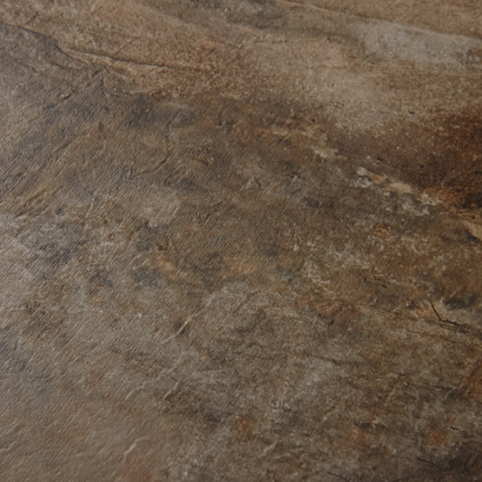 Close-up of a brown and gray stone surface