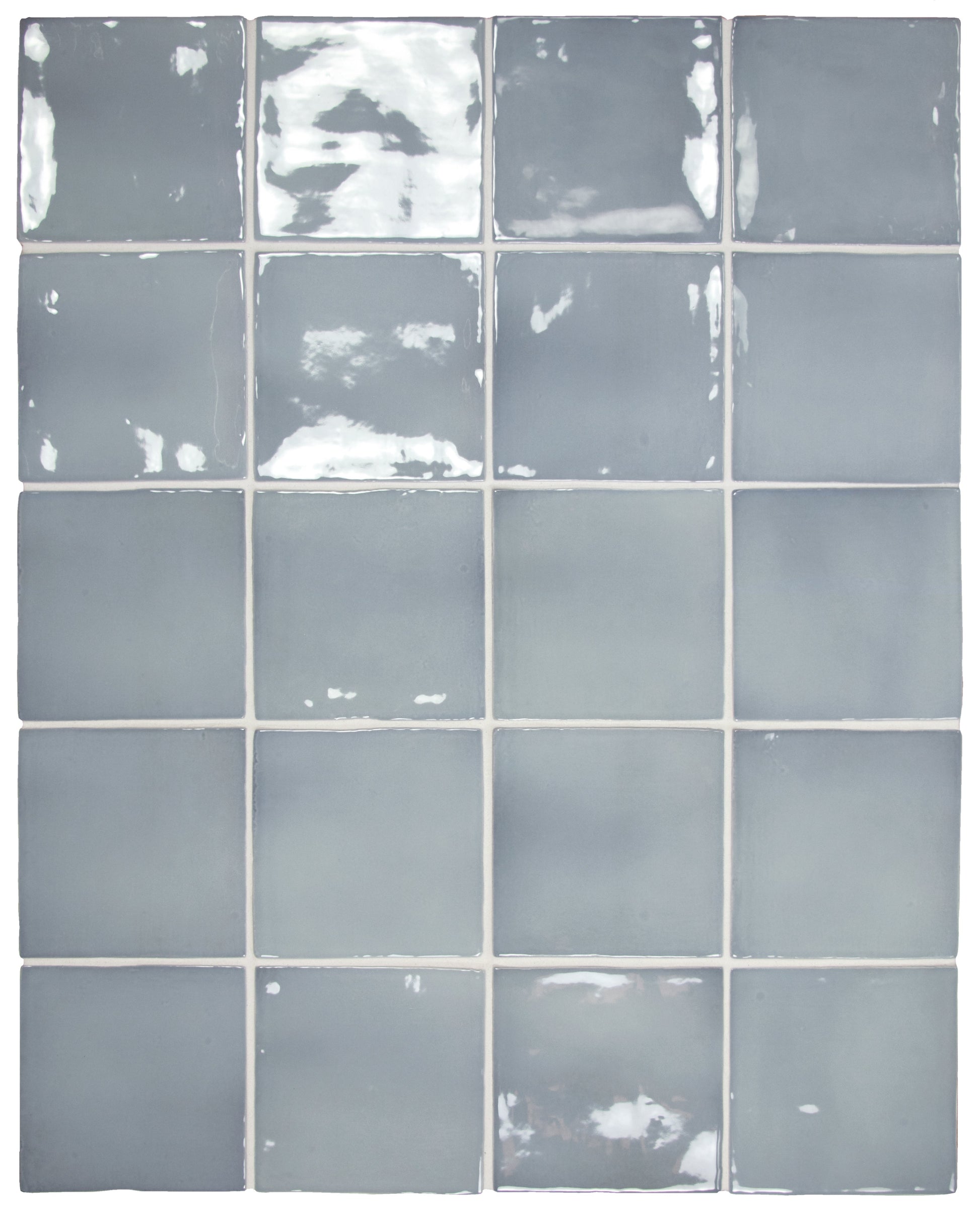 Grid of gray tiles with some chipped paint