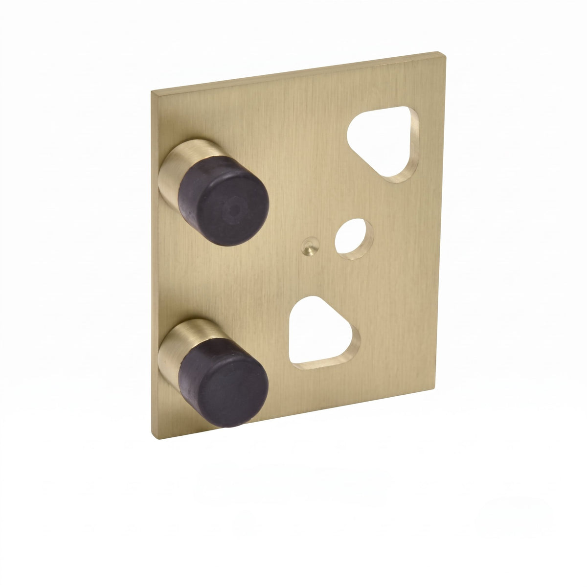 A square brushed brass door stopper plate with two round black rubber stoppers, shown on a plain white background.