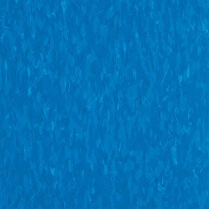 Solid blue color vinyl composition tile with a textured look