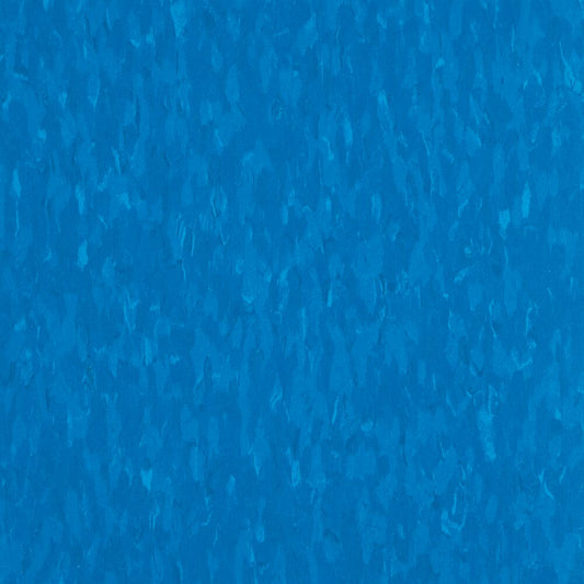 Solid blue color vinyl composition tile with a textured look