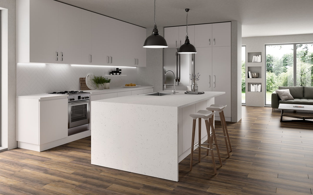 Modern kitchen with white island and wooden flooring