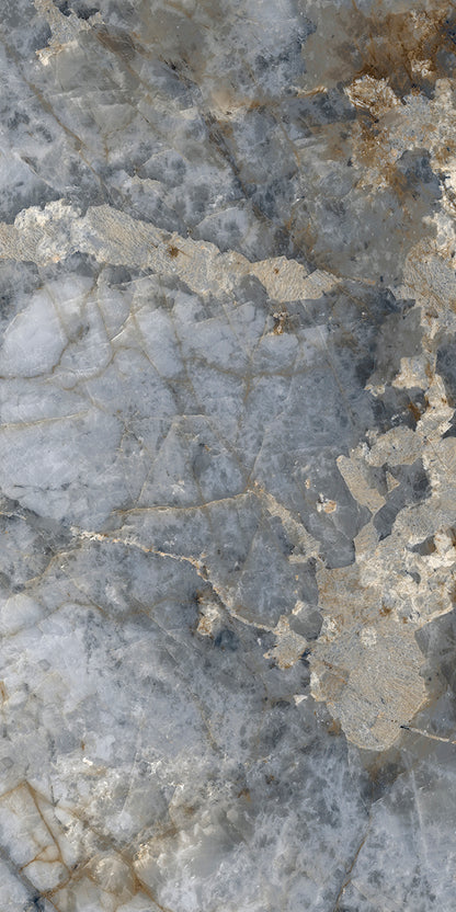 Close-up of a textured stone surface with gray and brown tones