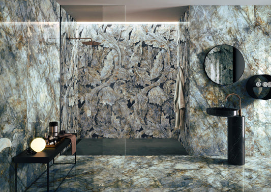Modern bathroom with marble walls and a sink.