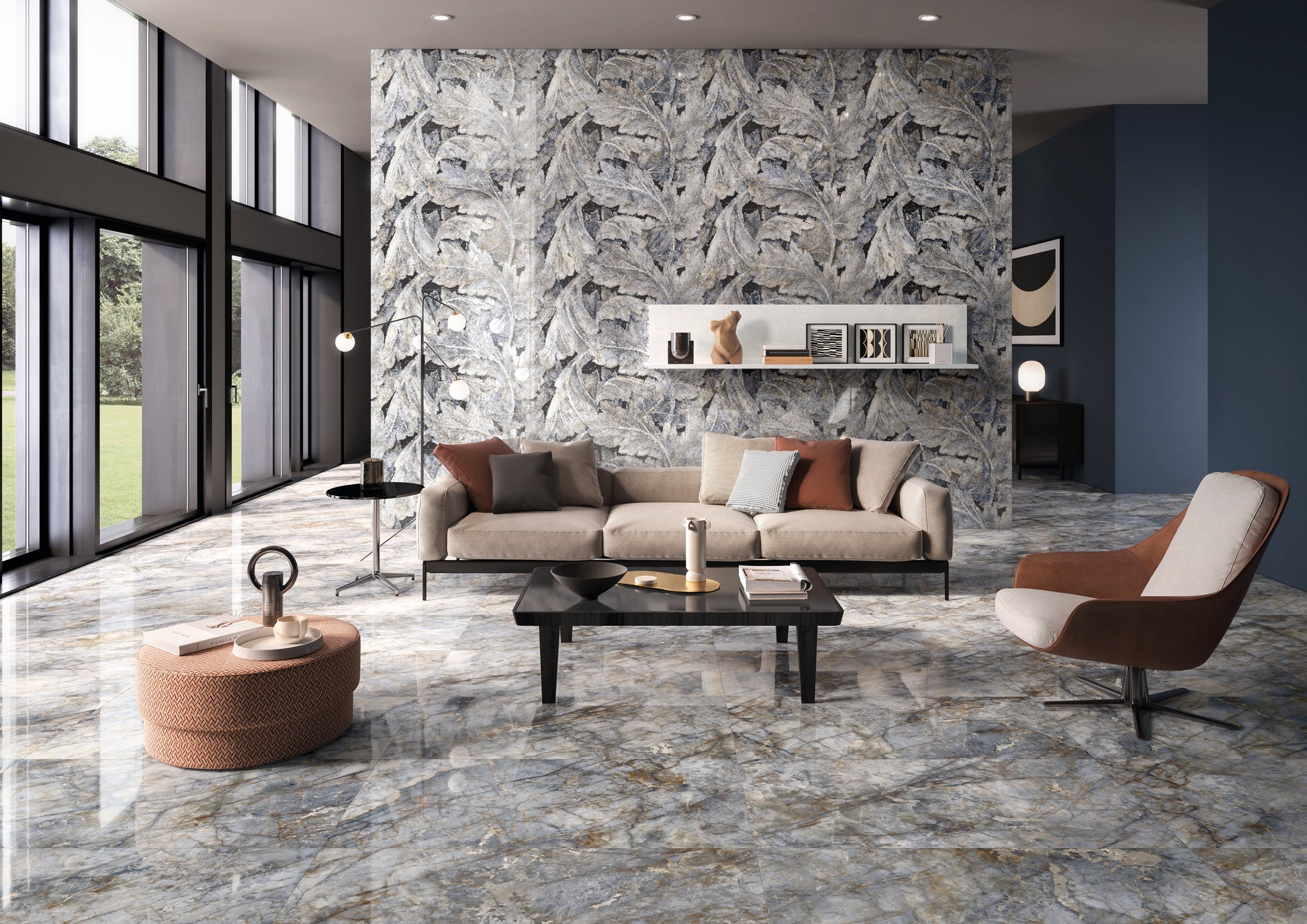 Modern living room with marble walls and floor, featuring a sofa and armchair.