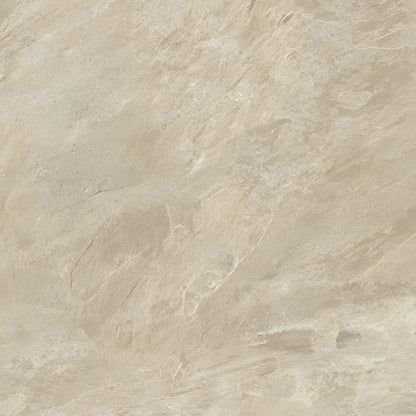 A close-up of a light beige stone or marble-like surface with soft gray and warm tan marbling and subtle texture.