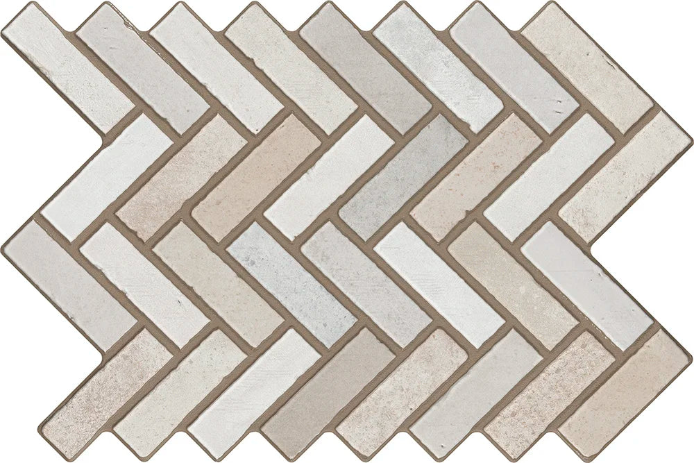 Herringbone pattern of beige and white tiles