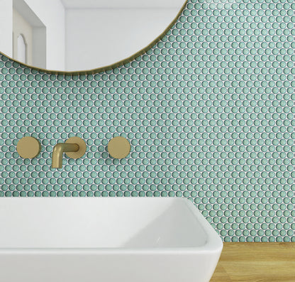 Bathroom with green penny tile wall and white sink