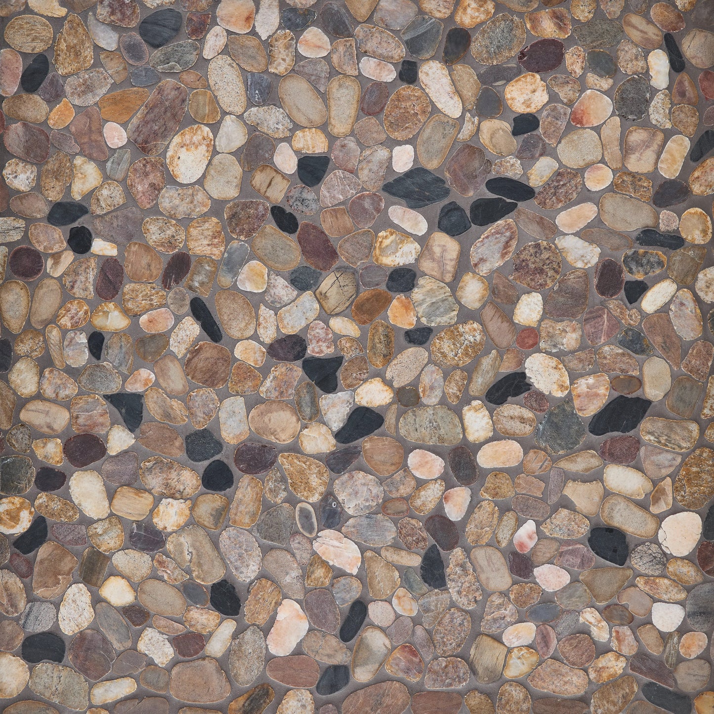 Pattern of small pebbles in various colors