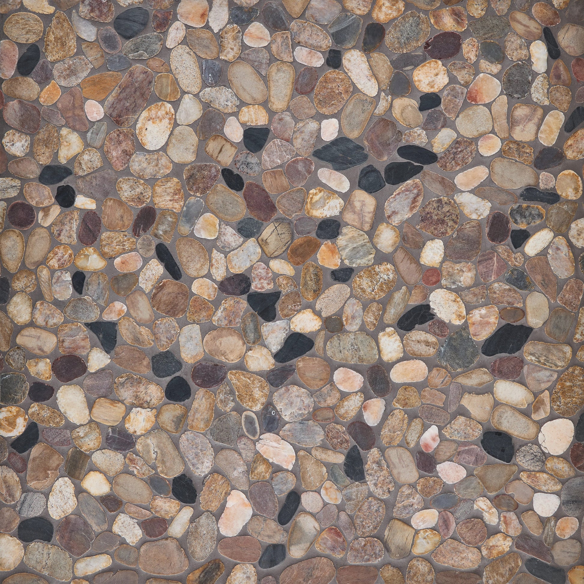 Pattern of small pebbles in various colors