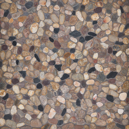 Pattern of small pebbles in various colors