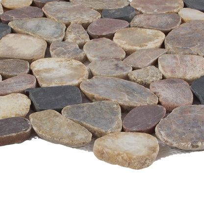 Close-up of variously shaped and colored stones on a white background