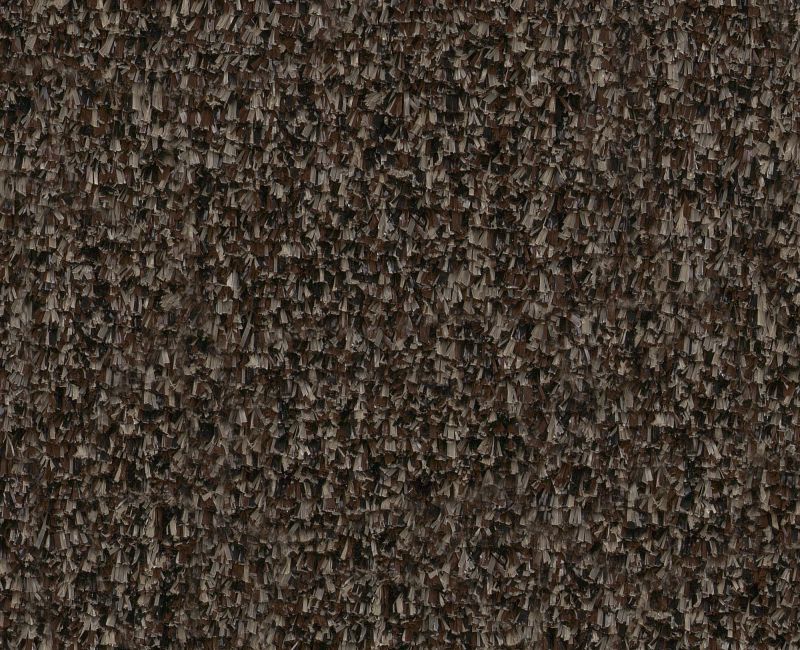 Close-up of a textured brown fabric pattern