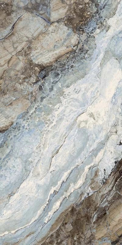 Close-up of a stone wall with gray and brown hues
