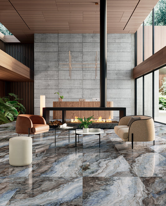 Modern living room with a fireplace, chairs, and a large window.