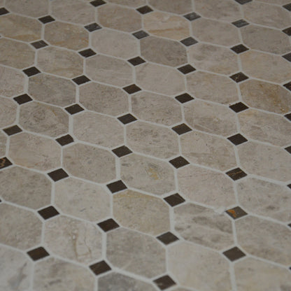 Hexagonal tile pattern with brown accents on a floor