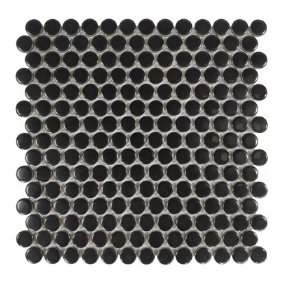 Black circular mosaic tile pattern on a white background