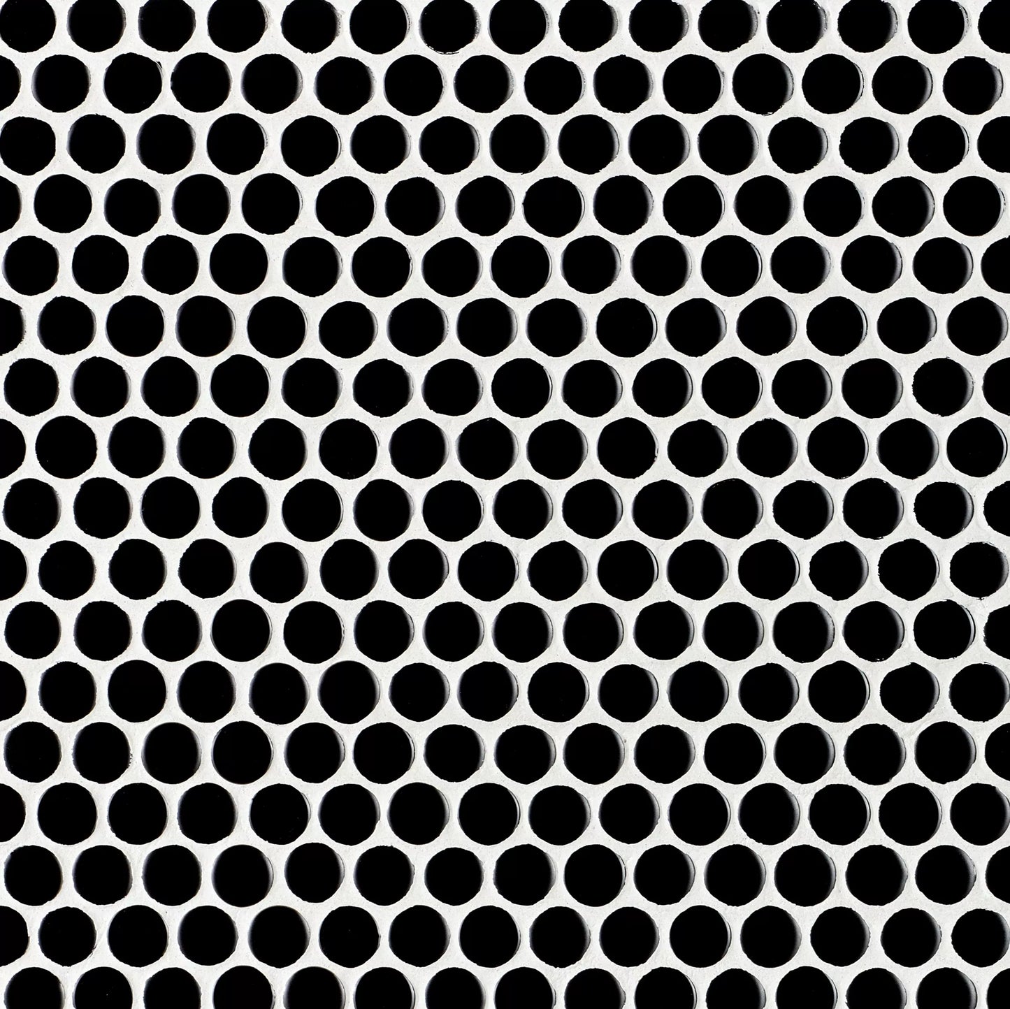 Pattern of black circles on a white background