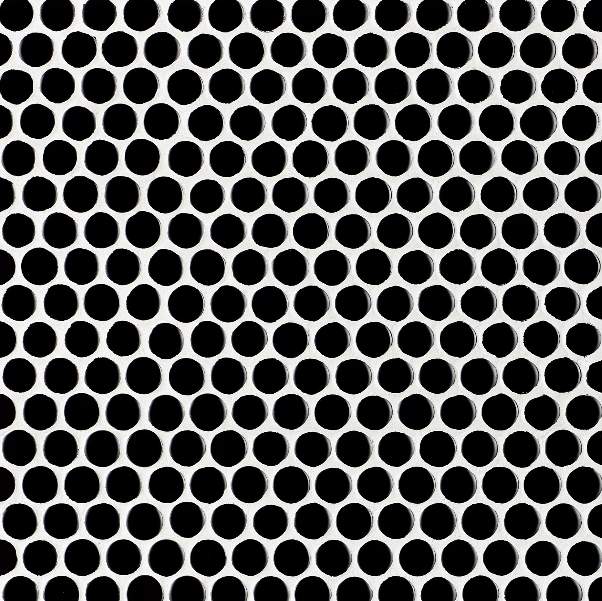 Pattern of black circles on a white background