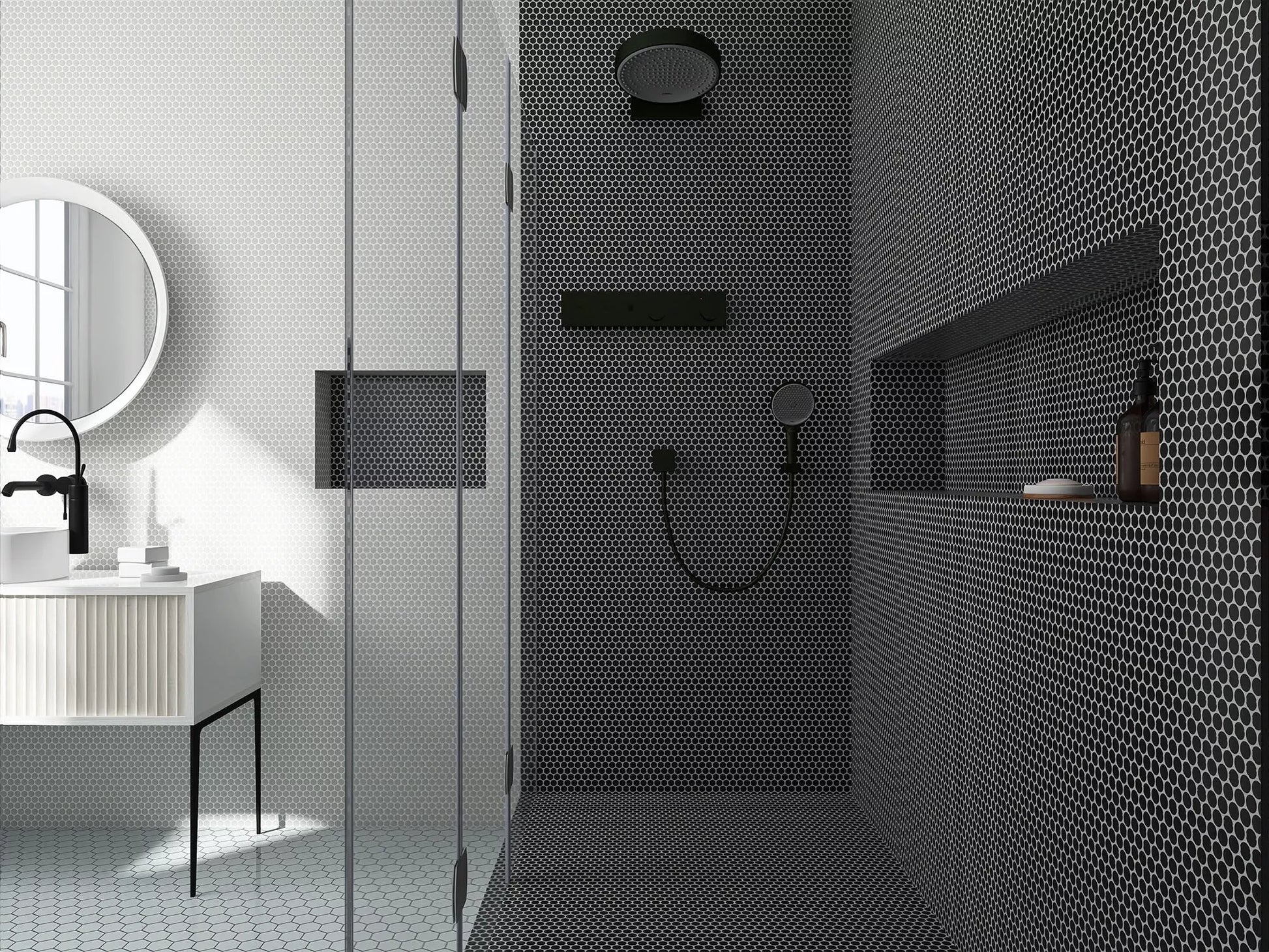 Modern bathroom with black tiled shower area and white vanity.