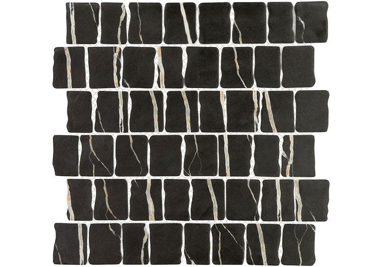 Black mosaic tiles with white veins on a white background