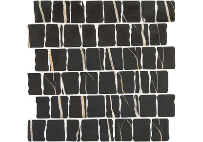 Black mosaic tiles with white veins on a white background