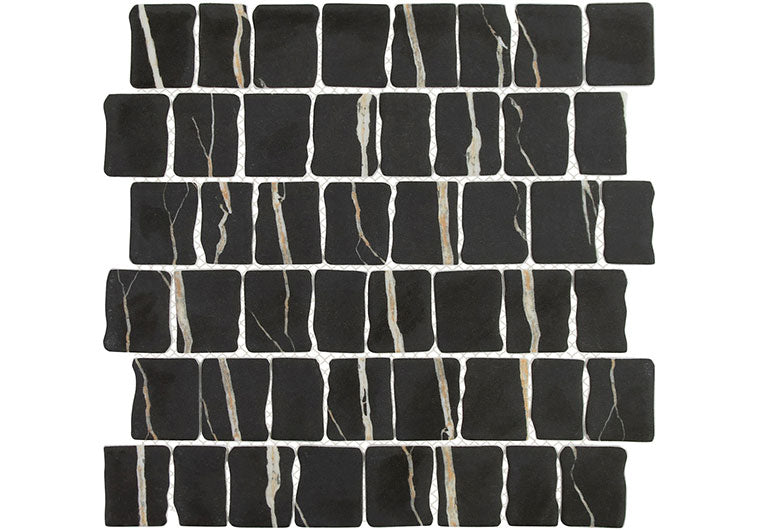 Black mosaic tiles with white veins on a white background