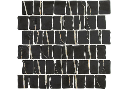Black mosaic tiles with white veins on a white background