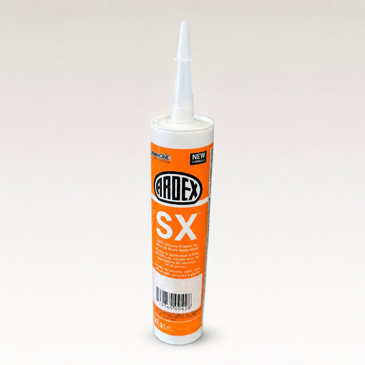 A tube of Ardex SX silicone sealant with an orange and white label, shown on a neutral light gray background.
