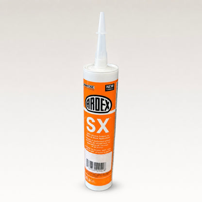 A tube of Ardex SX silicone sealant with an orange and white label, shown on a neutral light gray background.