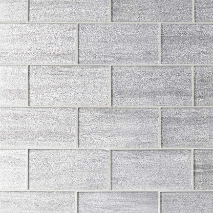 Pattern of gray rectangular tiles with a subtle texture