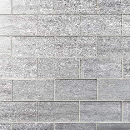 Pattern of gray rectangular tiles with a subtle texture