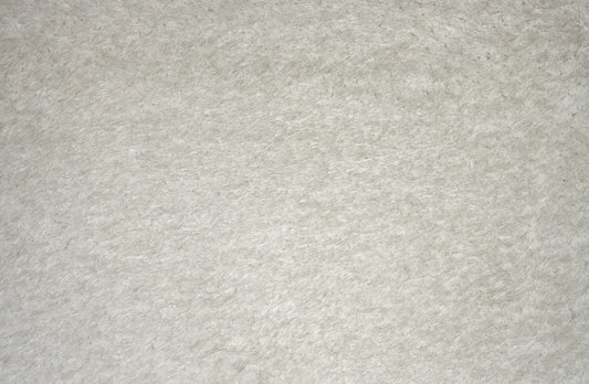 A close-up texture shot of a light gray felt or fleece fabric surface.