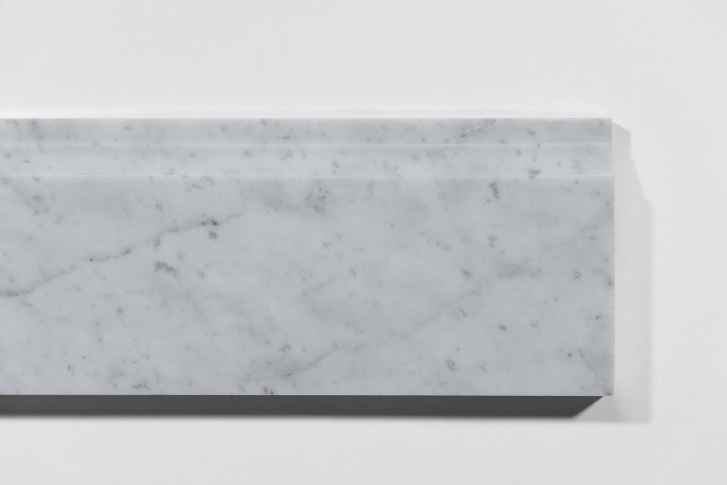 Teal-colored rectangular object on a white background