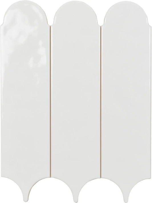 A glossy white ceramic tile with a decorative wavy scalloped border, shown from a top-down view.